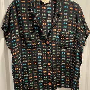 Sunglasses silk blouse.